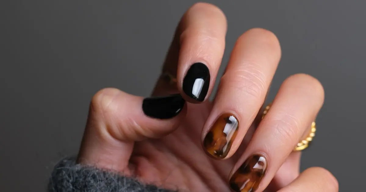 Close-up of professional gel nail manicure in a salon